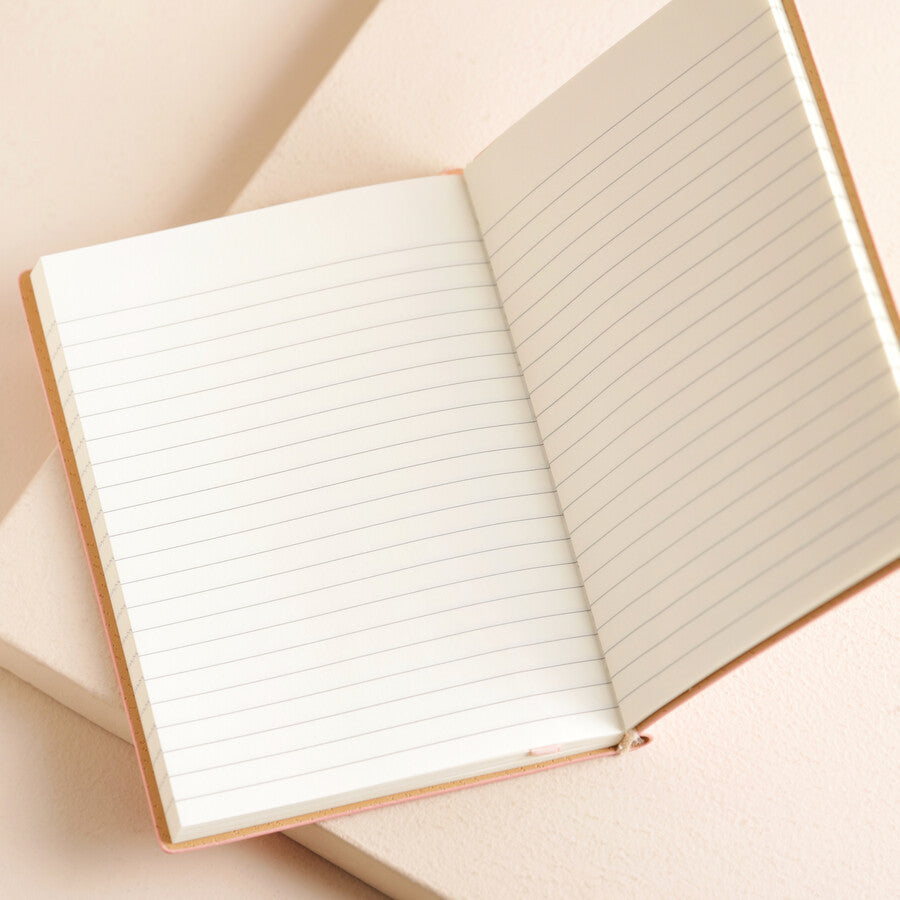 Pink vegan leather embossed notebook
