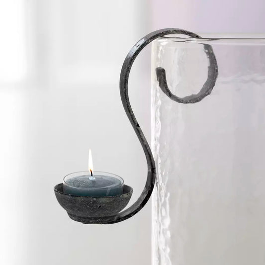 Hanging metal tea light holder