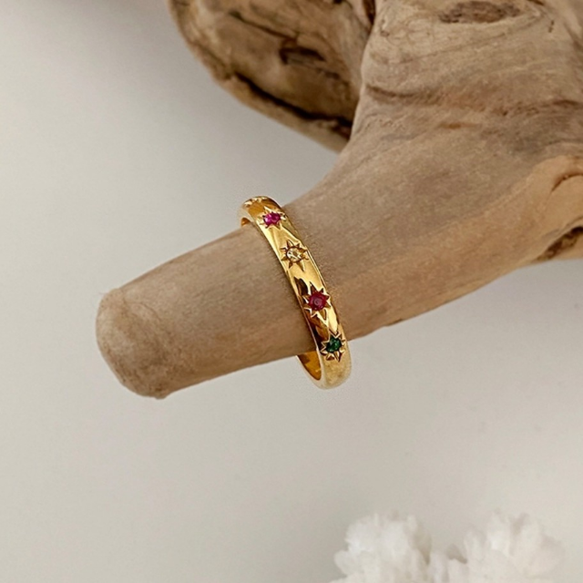 Engraved star detail band ring in multi stone