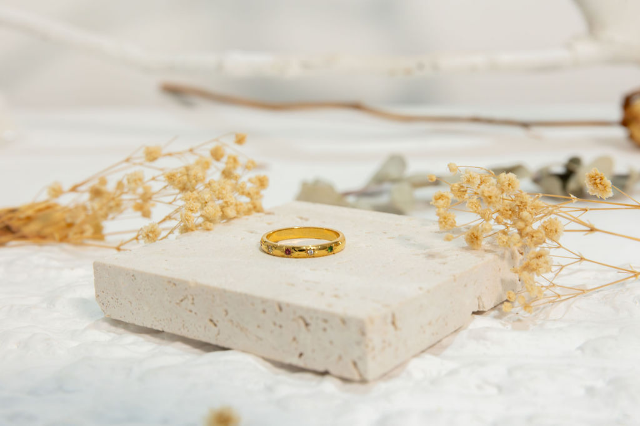 Engraved star detail band ring in multi stone