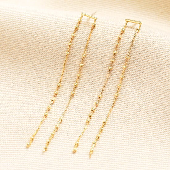 Gold hanging drop earrings