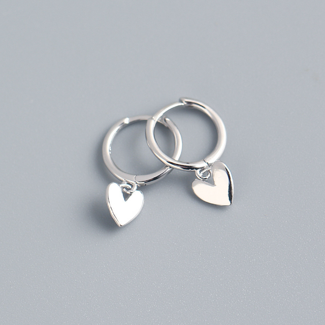 Heart charm huggie earring in silver