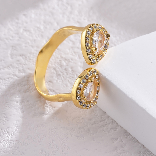 Double teardrop gem open ended ring in gold